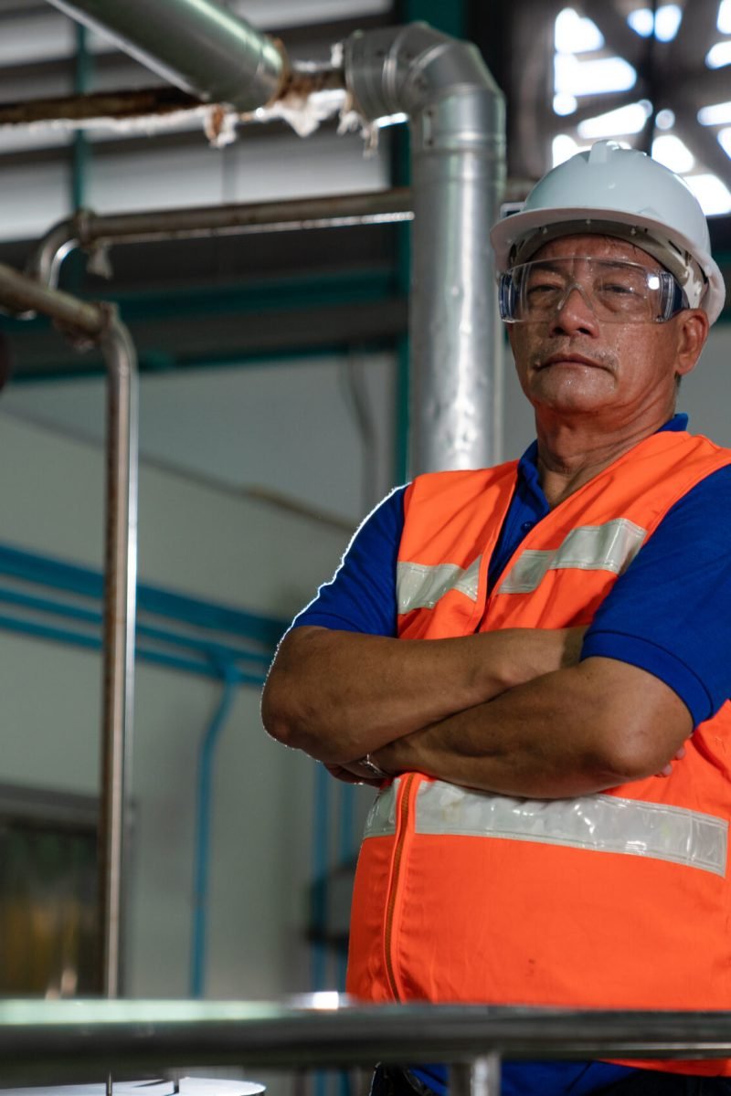 engineering man in protective safety uniform working with clipbo